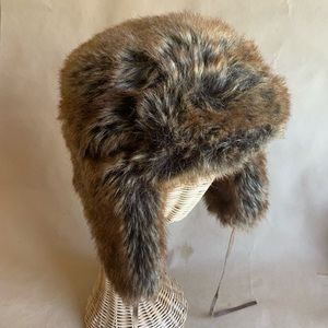 RESTRATION HARDWARE’s faux fur hat.